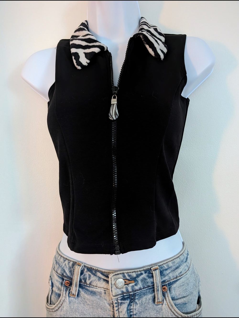 Black Sleeveless Zip Front Top with Fur Zebra Collar